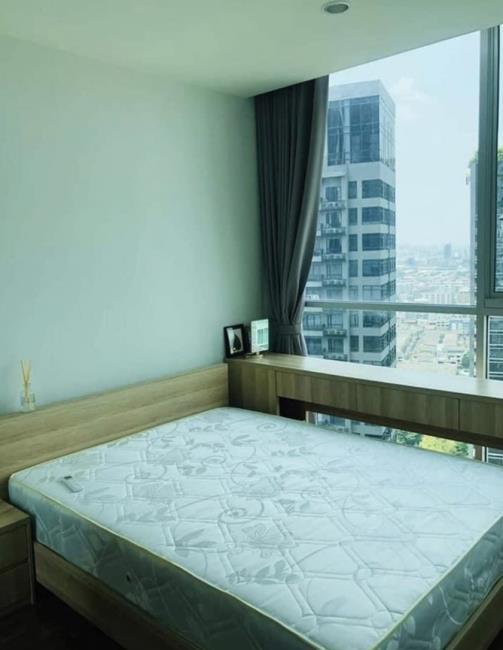 Noble Revolve Ratchada 2 เตียงนอน.jpg