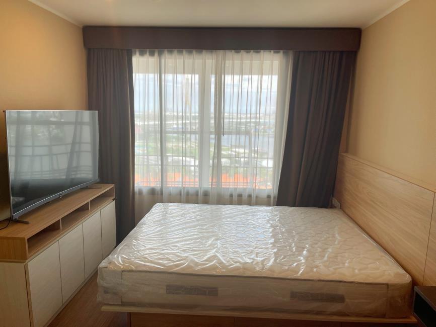 U Delight Residence Riverfront Rama 3 ทีวี เตียง.jpg