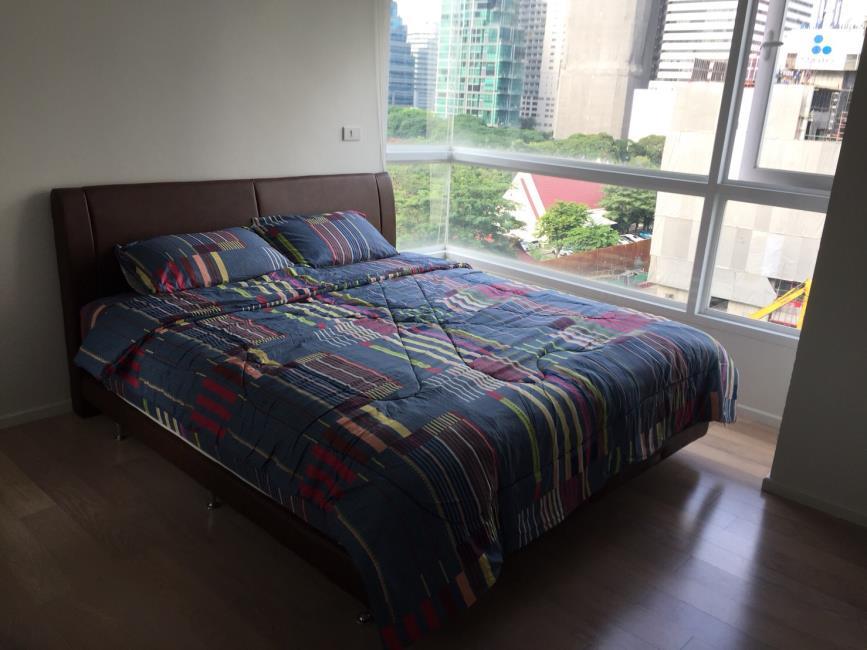 15 Sukhumvit Residences  เตียง.jpg